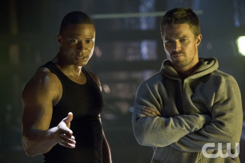 Arrow -- "Legacies" -- Image AR106b_5249b -- Pictured (L-R): David Ramsey as John Diggle and Stephen Amell as Arrow -- Photo: Jack Rowand/The CW -- ©2012 The CW Network. All Rights Reserved