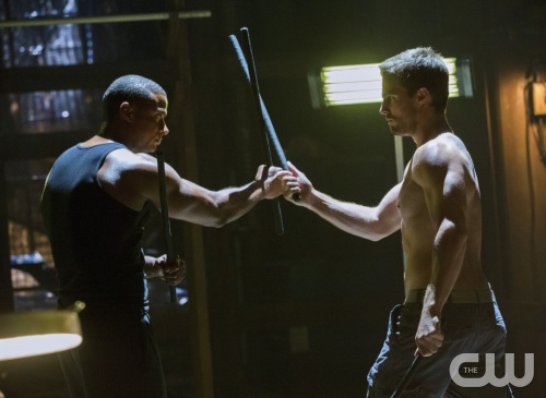 Arrow -- "Legacies" -- Image AR106b_5199b -- Pictured (L-R): David Ramsey as John Diggle and Stephen Amell as Arrow -- Photo: Jack Rowand/The CW -- ©2012 The CW Network. All Rights Reserved