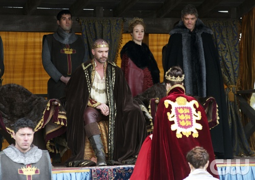 Reign -- "Slaughter of Innocence" -- Image Number: RE122a_0271.jpg -- Pictured (L-R): Alan Van Sprang as King Henry, Adelaide Kane as Mary, Queen of Scots (back to camera) Megan Follows as Queen Catherine and Gil Darnell as The Duke of Guise -- Photo: Sven Frenzel/The CW -- © 2014 The CW Network, LLC. All rights reserved. 
