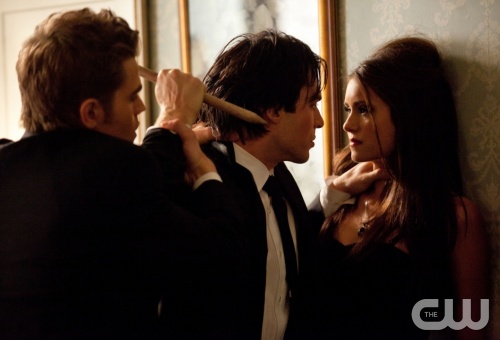 "Masquerade" - Paul Wesley as Stefan, Ian Somerhalder as Damon, Nina Dobrev as Katherine in THE VAMPIRE DIARIES on The CW. Photo: Bob Mahoney/The CW &copy;2010 The CW Network, LLC. All Rights Reserved.