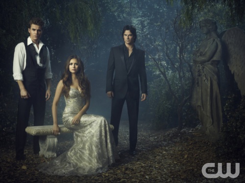 THE VAMPIRE DIARIES  Pictured (L-R): Paul Wesley as Stefan, Nina Dobrev as Elena, and Ian Somerhalder as Damon.  Image Number: VD4_3Shot_Garden_2386re.jpg.  Photo Credit: Justin Stephens/The CW.  © 2012 The CW Network, LLC. All rights reserved.