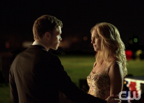 The Vampire Diaries -- "Graduation" -- Pictured (L-R): Joseph Morgan as Klaus and Candice Accola as Caroline -- Image Number: VD423b_2261.jpg â€” Photo: Curtis Baker/The CW -- © 2013 The CW Network, LLC. All rights reserved.