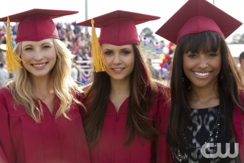 The Vampire Diaries -- "Graduation" -- Pictured (L-R): Candice Accola as Caroline, Nina Dobrev as Elena, and Kat Graham as Bonnie -- Image Number: VD423a_0299.jpg â€” Photo: Annette Brown/The CW -- © 2013 The CW Network, LLC. All rights reserved.